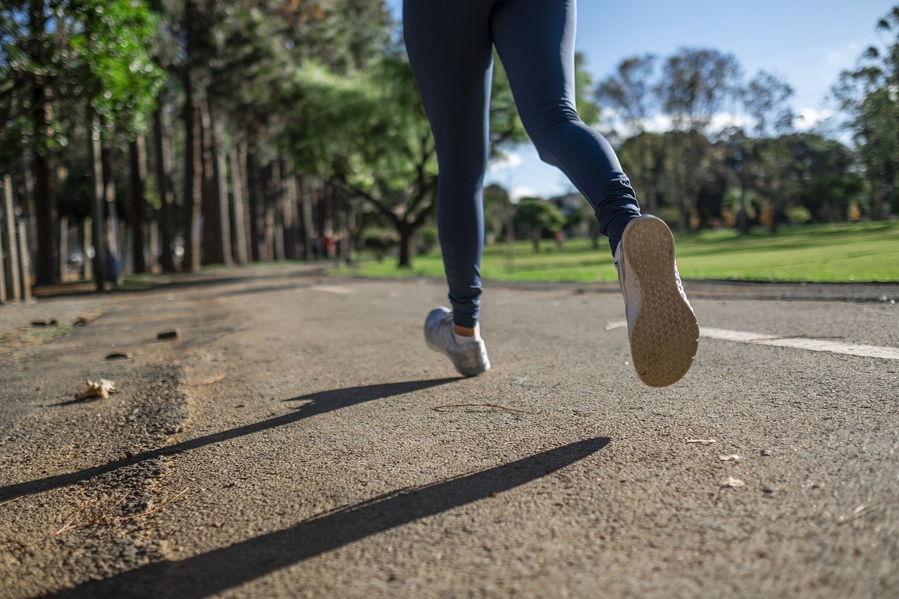 Healthy woman running outside